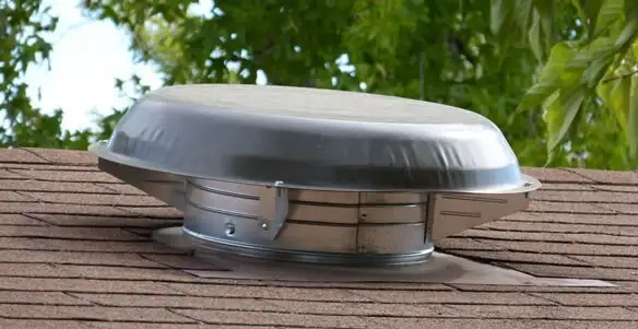attic fan installation services with low-profile roof ventilation unit in Atlanta, GA