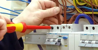 electrician services performing professional electrical panel wiring and connections in Atlanta, GA