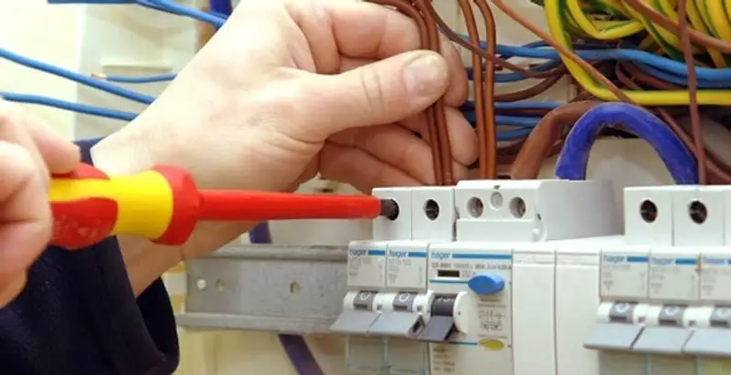 electrician services performing professional electrical panel wiring and connections in Atlanta, GA