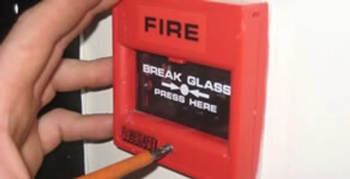 fire alarm installation service showing manual fire alarm pull station installed by licensed electricians in Atlanta, GA