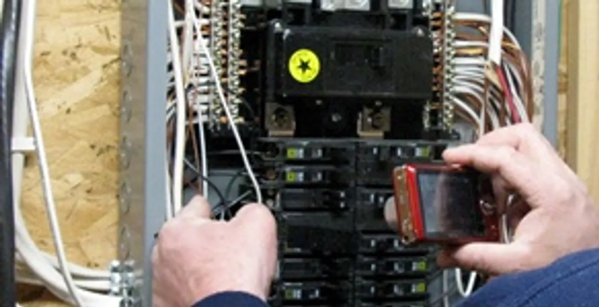 Home electrical inspection of circuit breaker panel by licensed electrician in Atlanta, GA