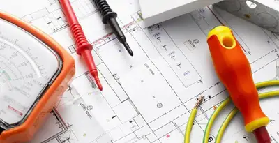 licensed electrician planning and testing electrical systems using professional tools in Atlanta, GA