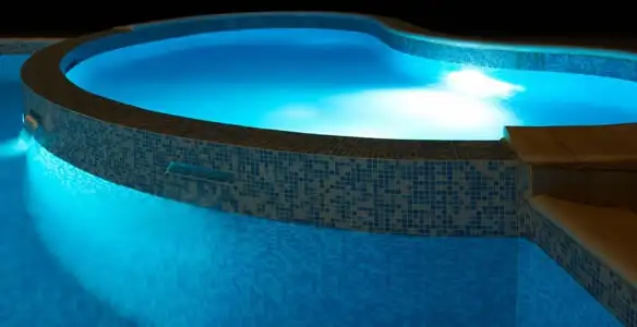 pool light installation and repair services highlighting illuminated pool interior lighting in Atlanta, GA