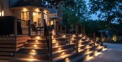 Residential electrician installing outdoor lighting for home safety in Atlanta, GA