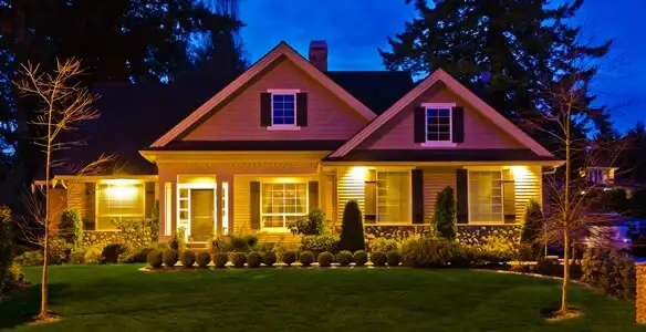 security light installation services illuminating a residential exterior at night in Atlanta, GA